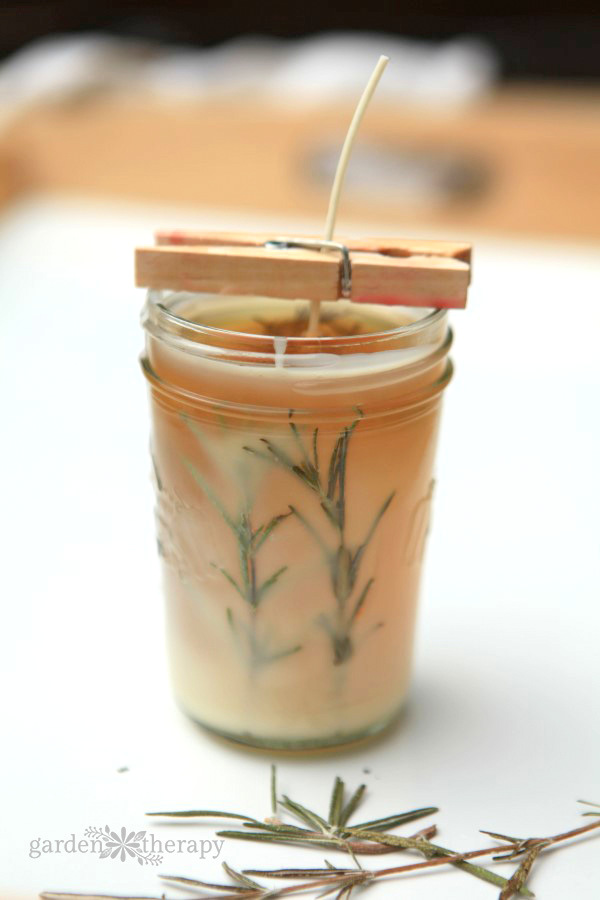  It’s a special kind of time-stopping magnificence that has me making candles like this rosemary pressed herb candle over and over again! 