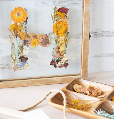 This DIY monogram pressed flower art is a cinch to make when flowers abound. And it’s one of the best pressed flower craft ideas for flowers you have saved from special occasions such as Mother’s Day or a wedding.