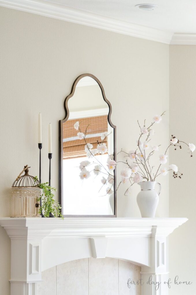 If you feel your fireplace mantel has too many things on it, try this airy design. 