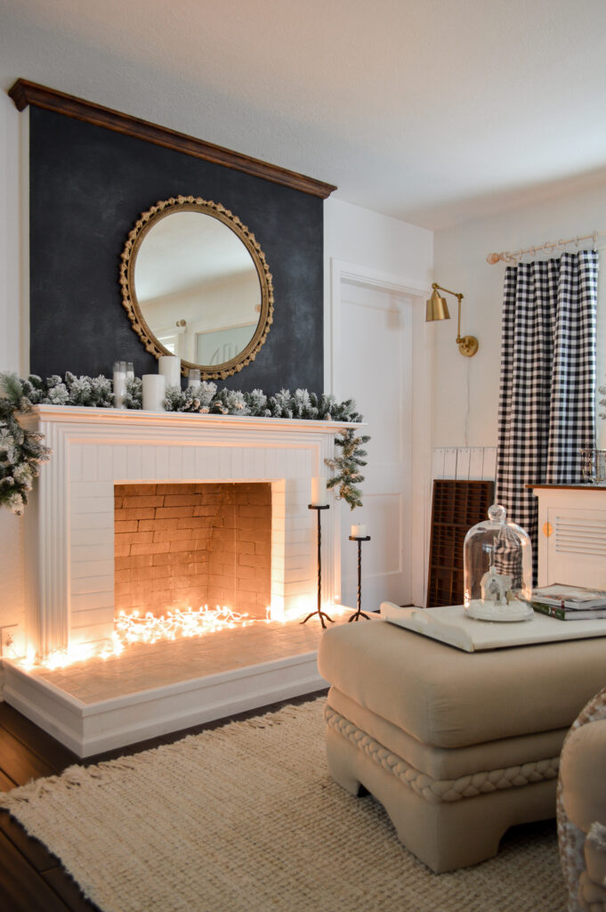 Mixing garland and candles on your mantel can make for depth in design.