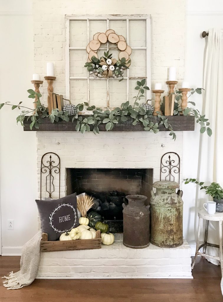 If you like lighter tones mixed with simplicity, this rustic farmhouse mantel is right up your alley.