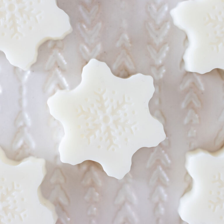 Need an easy winter craft idea? Make these DIY snowflake soaps. It’s surprisingly easy to create these snowflake shaped soaps in minutes!
